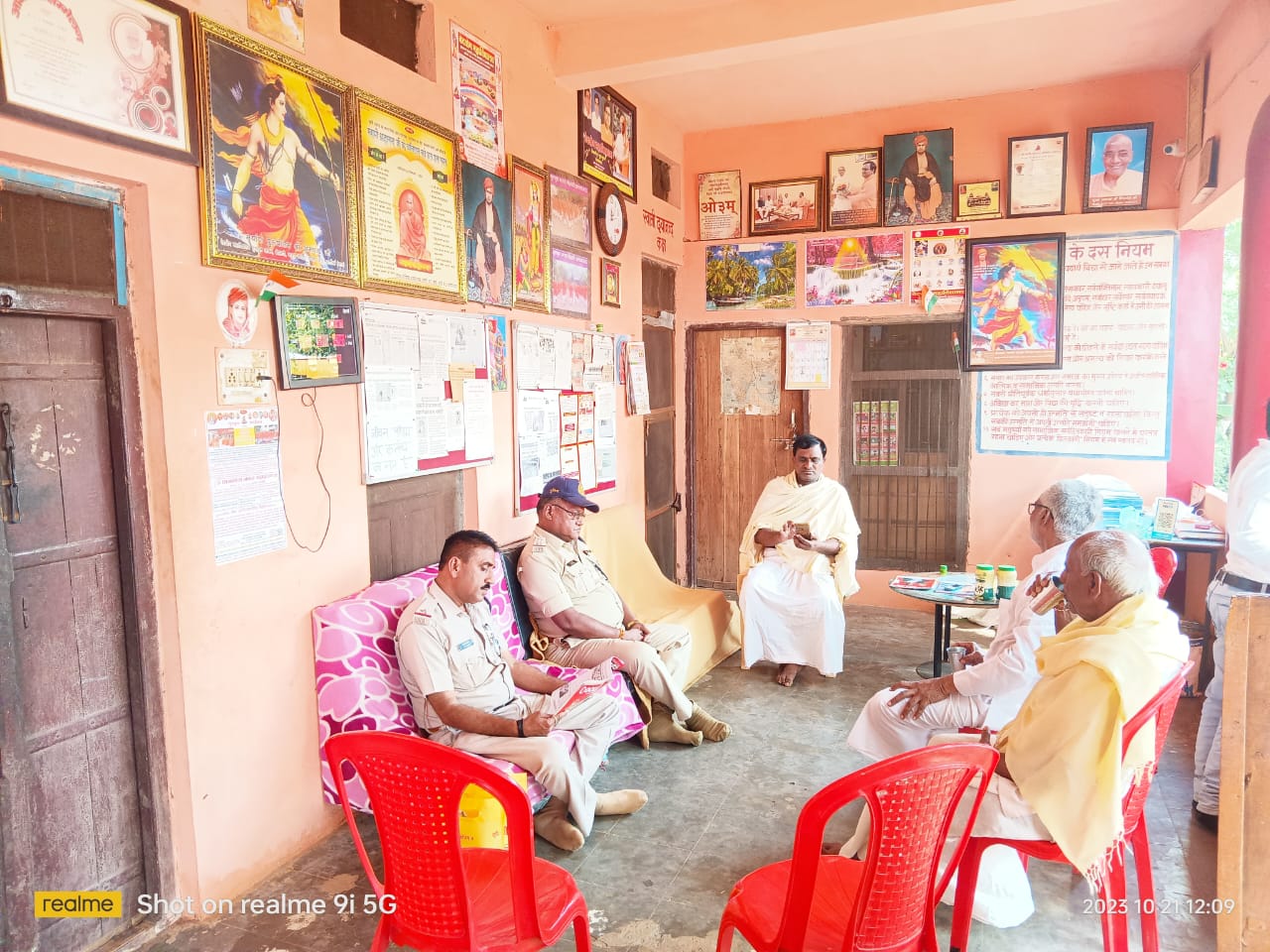 Administrative meeting with community leaders and officials in office setting